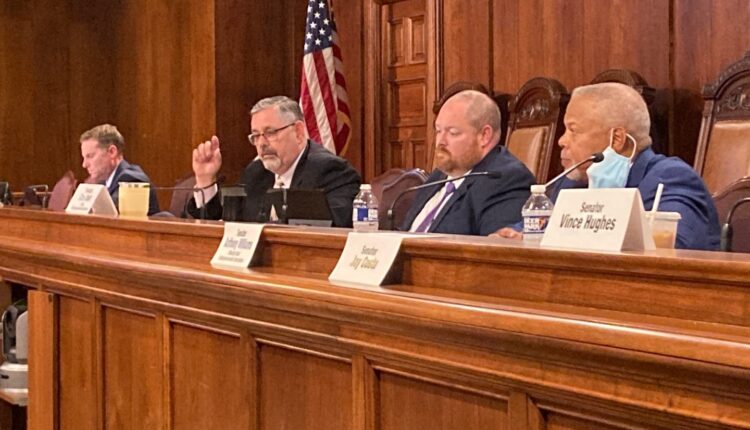 Sen. Cris Dush (R-Cameron), second from left, responds to questions raised by Sen. Anthony Williams (D-Delaware), right, during a state Senate Intergovernmental Operations Committee hearing on investigating the 2020 and 2021 elections on Sept. 9, 2021.