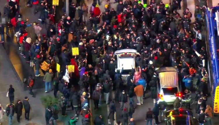Protestor jumps on NYPD car during Tyre Nichols rally in NYC