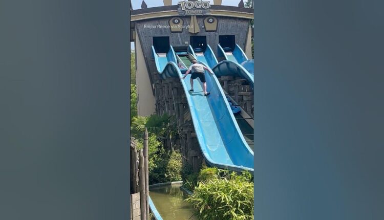 Not all heroes wear capes... Dad goes up water slide to get his daughter who got stuck #shorts