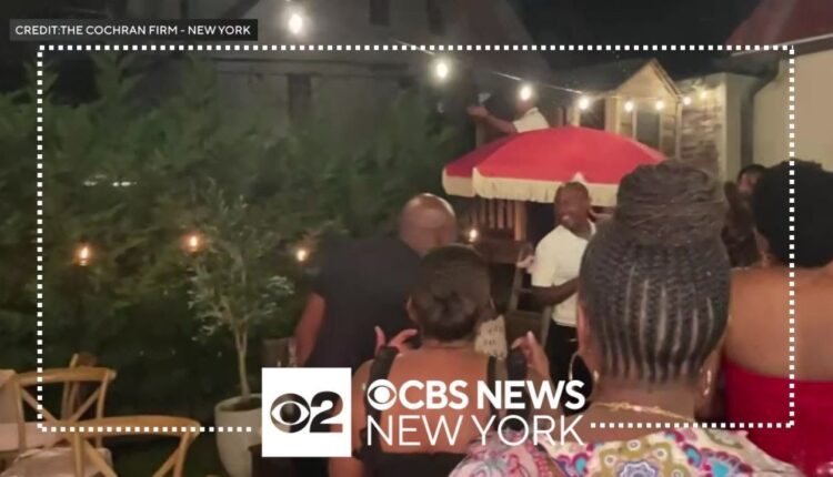 Queens doctor accuses neighbor who sprayed water at guests of racism