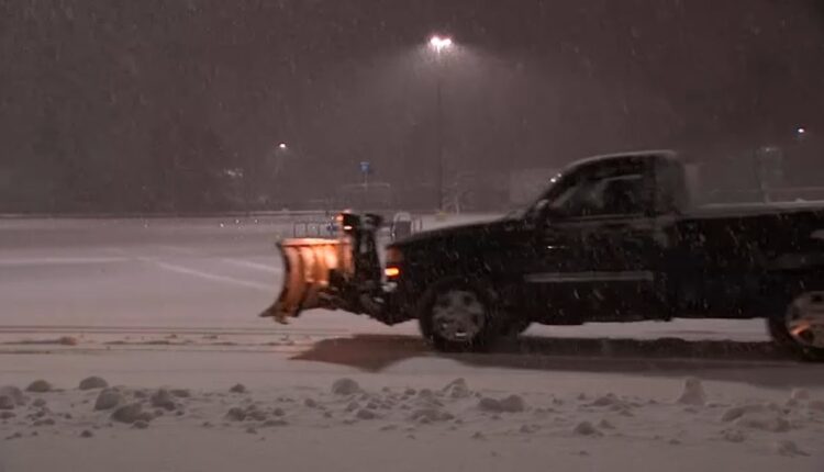 Snow piles up on roads in Orange County