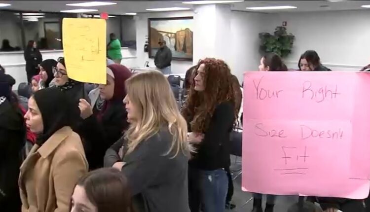 Parents rally over decision to shuffle teachers to other schools